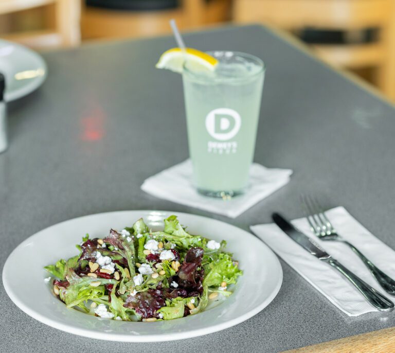 a table set with a salad